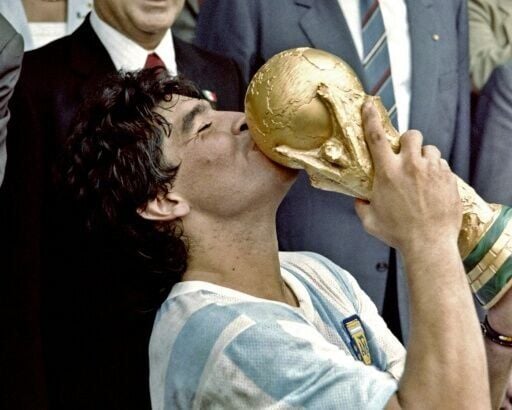 Argentina is holding a new trial over the death of football legend Diego Maradona, seen here kissing the FIFA World Cup in 1986 after Argentina's victory of West Germany in the final