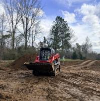Selma AmeriCorps celebrates skid steer certification for 14 members