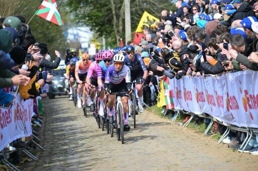 A 13-man break, including Mongolian Sainbayaryn Jambaljamts (C), escaped in the first 40km and built up a maximum lead of about five-and-a-half minutes