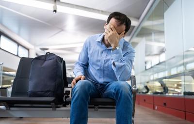 frustrated man at airport