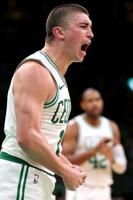 Cavs hold off Heat to book NBA playoff berth