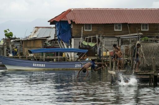 Year after exodus, silence fills Panama island threatened by sea