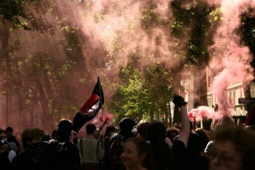 Masked protesters attack Socialists at France May Day rally