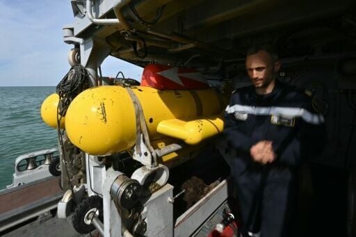 Yellow underwater robots dubbed 'Self-Propelled Fish' are used to identify and then detonate mines