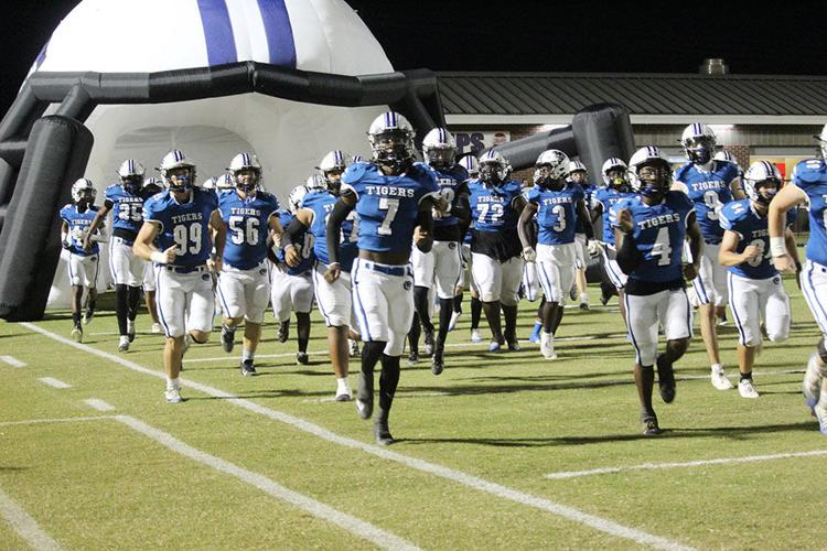 Demopolis running out from helmet.jpg