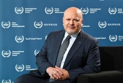 ICC prosecutor, under investigation, steps aside temporarily