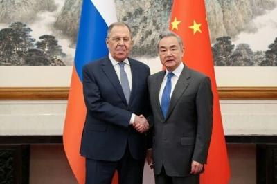 Russian Foreign Minister Sergei Lavrov criticised efforts he said were aimed at 'containing' Russia and China during a meeting with counterpart Wang Yi in the Chinese capital