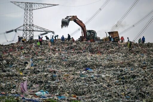 A massive pile of waste at the Cipayung landfill in Depok, West Java, which often slides and clogs the river, sending waste to the outskirts of Jakarta during heavy rains