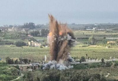 A fireball rises from the site of an Israeli airstrike that targeted the Qasmiyeh bridge near Tyre district, after Israel said the bridge was being used by Hezbollah
