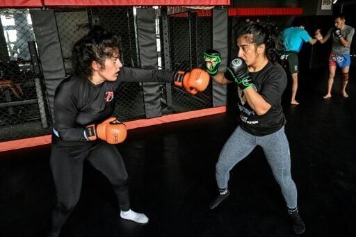 Pioneering Pakistan woman MMA fighter breaks barriers... and arms
