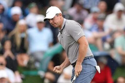 McIlroy and Spaun battle into Monday playoff at storm-hit Players