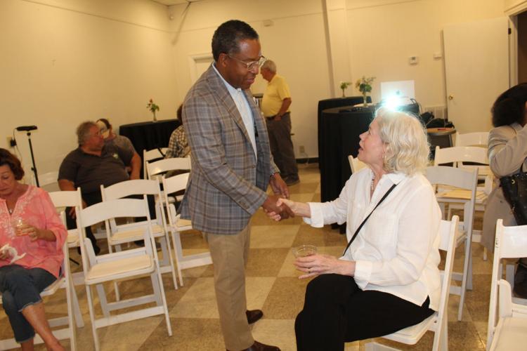 Johnny Moss shaking hands