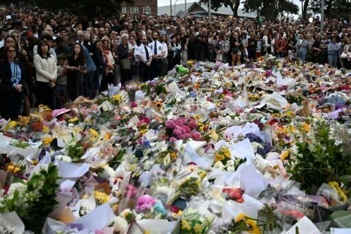 Mourners gather at a tribute in memory of the victims of a shooting at Bondi Beach.
