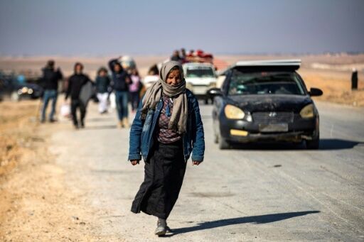 Syrian rebels surround Hama 'from three sides', monitor says