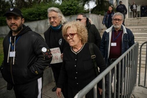 Magda Fyssas (C), mother of anti-fascist rapper Pavlos Fyssas who was murdered by Golden Dawn members joined demonstrators outside court