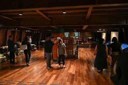 People visit the Galeon Espiritu Santo, a full-scale representation of a 17th century galleon, on display at the Museo del Galeon in Manila
