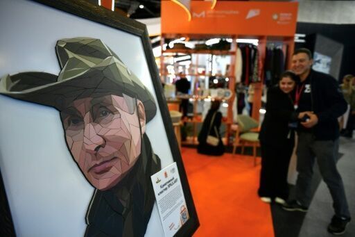 Putin T-shirts, robots and the Taliban -- but few Westerners at Russia's Davos