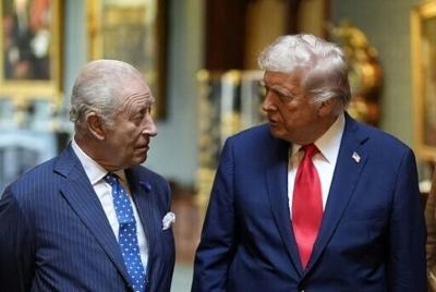 Britain's King Charles III talks with US President Donald Trump during a state visit to the UK in September 2025