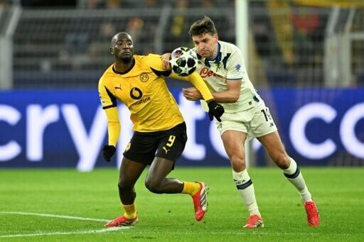 Serhou Guirassy (L) scored the opener as Borussia Dortmund beat Atalanta 2-0 in Germany