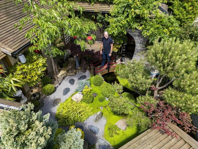 A dad has spent £20K transforming his backyard into a stunning Japanese garden.