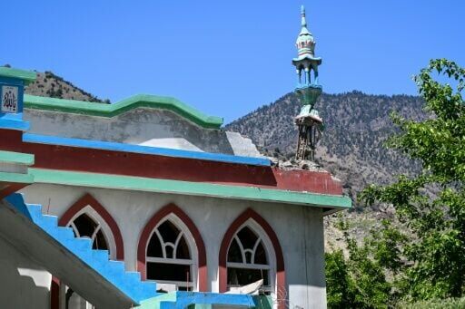 A damaged minaret of a mosque in Barikot village