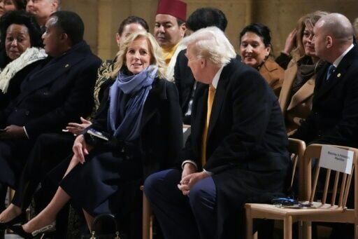 French first lady helps keep Trump, Bidens apart at Notre Dame