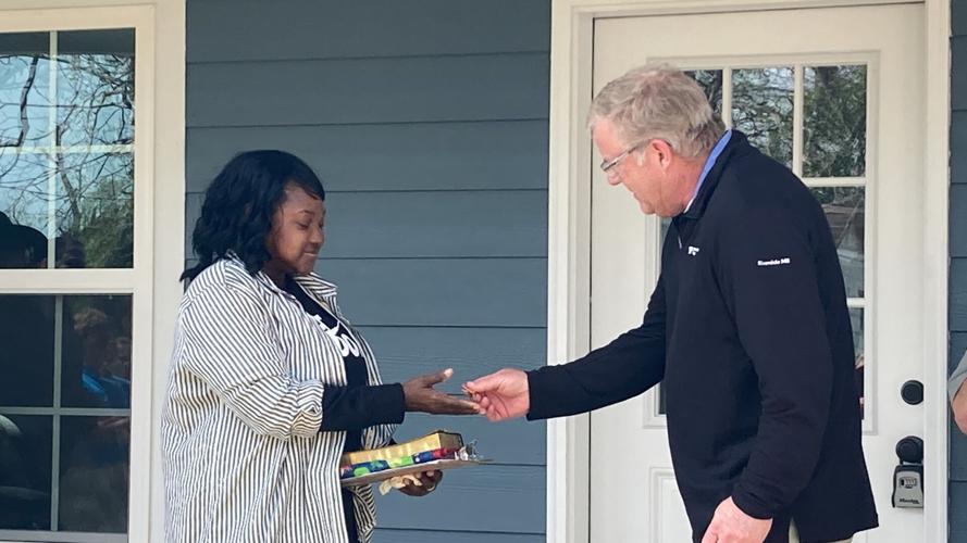Long-term Recovery Group hands keys to four new homeowners