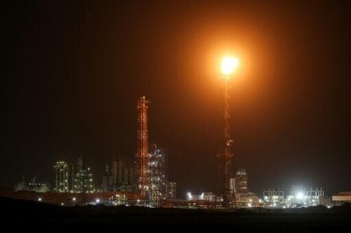 Excess gas is burned at the oil refinery in Israel's northern city of Haifa late on March 19, 2026