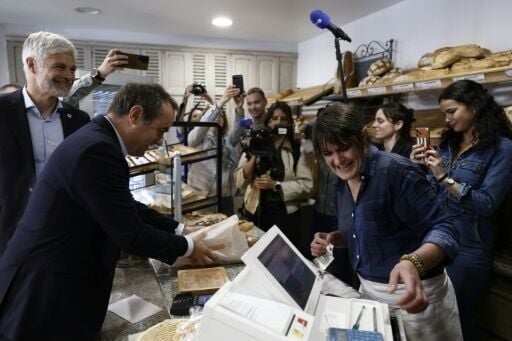 France's Prime Minister Sebastien Lecornu buys his bread