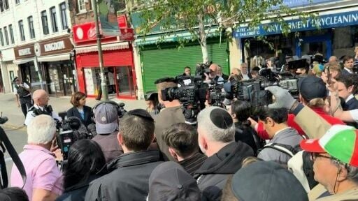 Londoners chant 'shame on you' at site of stabbing of two Jews