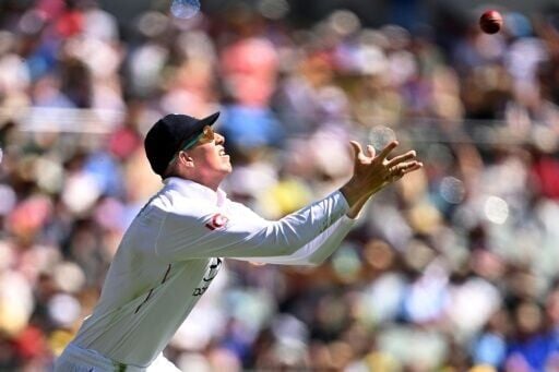 England's Zak Crawley takes a catch to dismiss Australia's Travis Head for 170 on the fourth day of the third Ashes Test