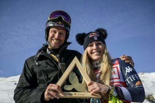 Lindsey Vonn poses with her coach and former Norwegian skier Aksel Lund Svindalin St. Moritz