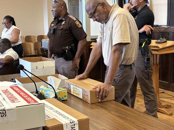 Sheriff Roy Fikes with ballots
