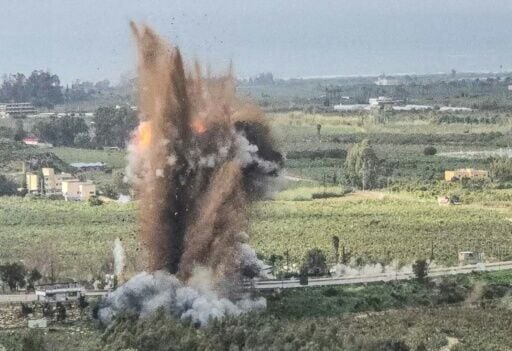 An Israeli air strike blows up a key bridge in southern Lebanon