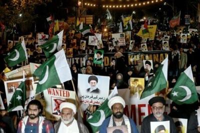 Pakistani Shiite Muslims shout slogans to condemn the US-Israel attack on Iran during a protest in Karachi on February 28, 2026.