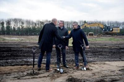 Morten Bodskov (C) put the first symbolic shovel in the ground in the town of Vojens