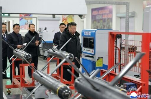 A photo released by North Korean state media shows leader Kim Jong Un visiting a missile factory this week