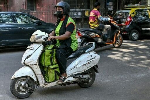 In India's congested cities, delivery apps cash in