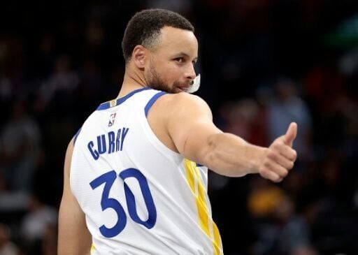 Golden State star Stephen Curry reacts during the Warriors' NBA play-in victory over the Los Angeles Clippers