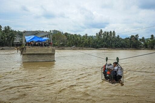 Damage to infrastructure including many broken bridges is making relief work in Indonesia difficult