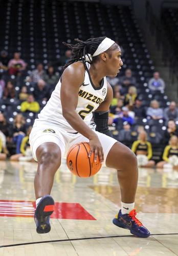 Mizzou guard Saniah Tyler (2) dribbles between her legs