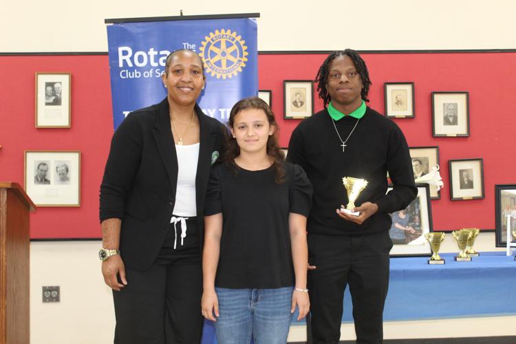 Dereke with award and Jerria