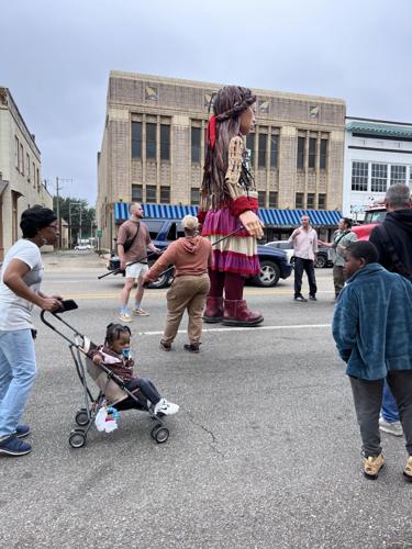 Little Amal puppet wows Selma as crowd gathers to follow her through downtown, photo gallery