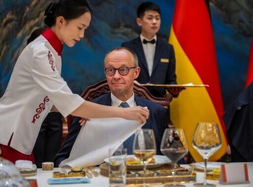 German Chancellor Friedrich Merz is served lunch at the Great Hall of the People