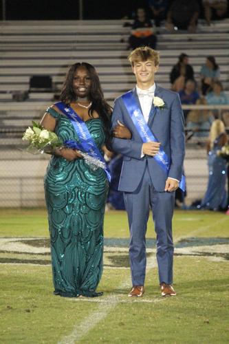 Jamiya James, escorted by Lawson Boone