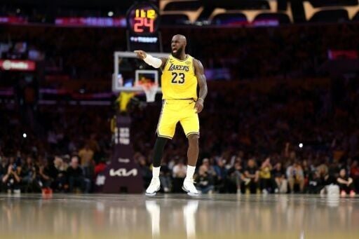 Los Angeles Lakers star LeBron James reacts after making a shot in the Lakers' win over the Houston Rockets in their NBA playoff opener