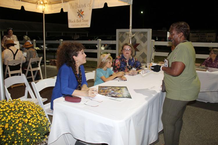 Johnna talking to lady