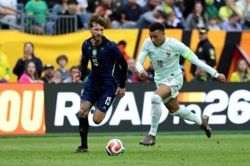 Kylian Mbappe (R) in action for France in Thursday's friendly win over Brazil in the United States