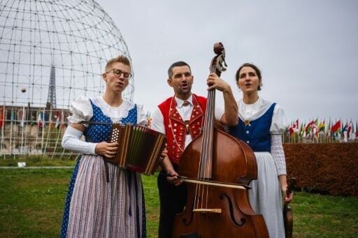 Members of the yodelling trio 'Rond Om de Santis' performing in the garden of UNESCO's headquarters in Paris