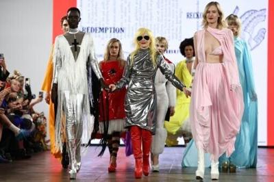 British designer Pam Hogg (C) presented her first fashion collection in 1981